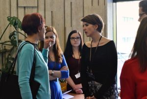 Women talking during the ExRe(y) Conference break
