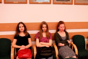 3 women listening to the presentation at ExRe(y) Conference